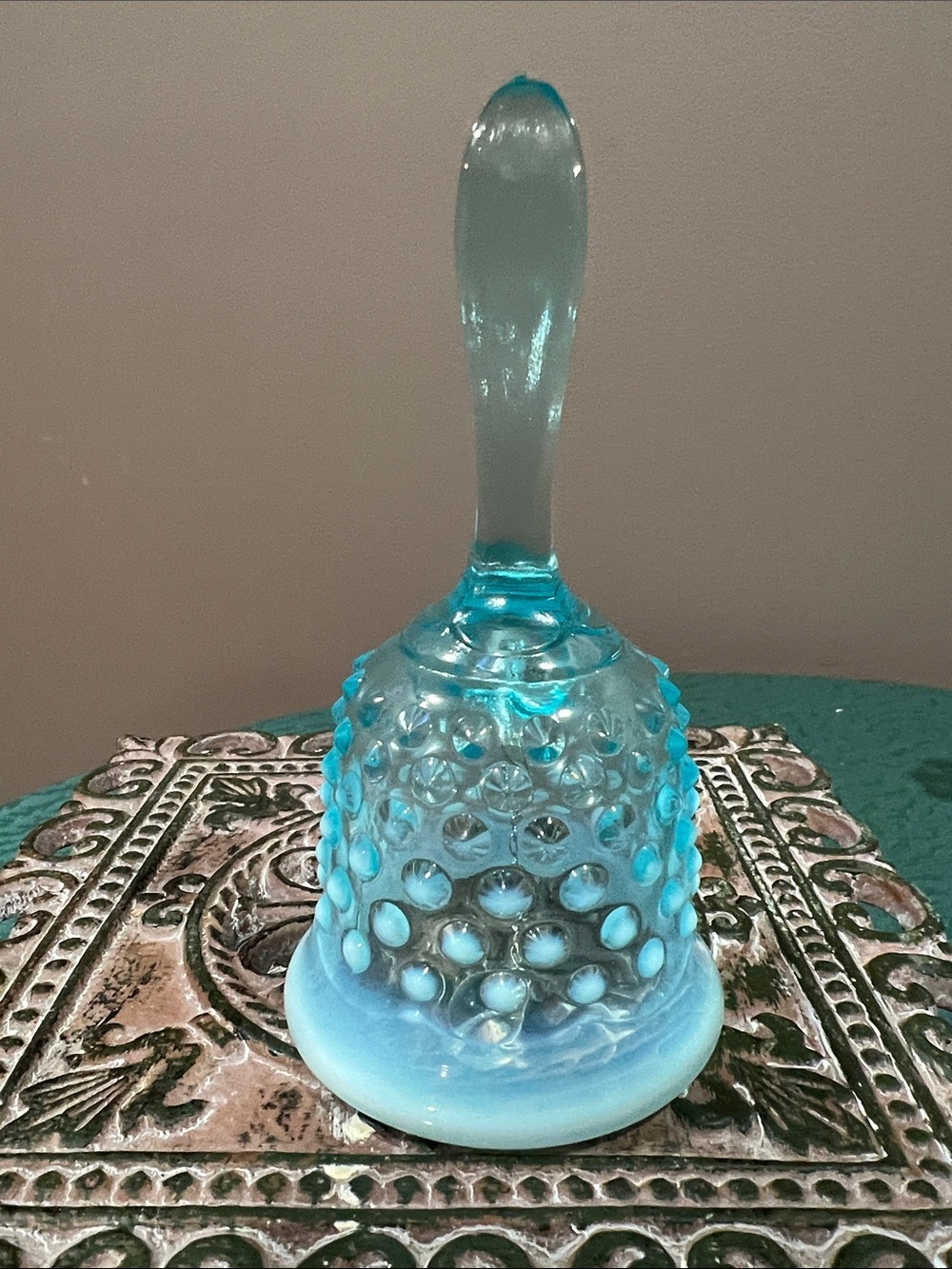 Fenton blue opalescent hobnail glass bell with clapper.